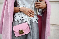 PARIS, FRANCE - SEPTEMBER 26: Osiris Martinez poses wearing a Jacquemus coat, Zara shirt, COS skirt and Furla bag on September 26, 2014 in Paris, France.  (Photo by Vanni Bassetti/Getty Images)