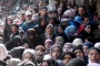 Residents of the besieged Palestinian camp of Yarmouk, queuing to receive food supplies, in Damascus, Syria in January. Last week, Islamic State militants infiltrated the camp. 