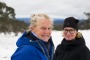 Jayne Webster and Catherine Sim from Melbourne enjoy the snow on Mt Ginini in the Brindabellas on Wednesday morning. 