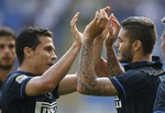 Inter Milan forward Mauro Icardi, of Argentina, right, celebrates with his teammate midfielder Anderson Hernanes