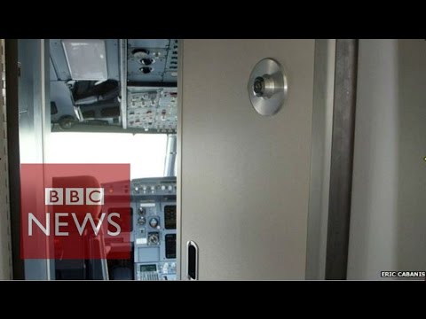 How pilots operate the cockpit door on a commercial jet - BBC News