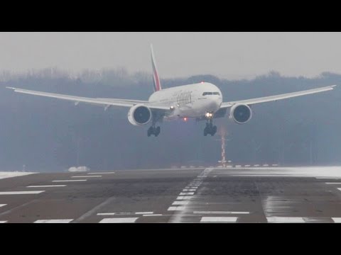 Crosswind Landings during a storm at Düsseldorf on an icy runway. Boeing 777, Airbus A340, A330