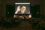 File - NSA leaker Edward Snowden appears on a live video feed broadcast from Moscow at an event sponsored by the ACLU Hawaii in Honolulu on Saturday, Feb. 14, 2015.