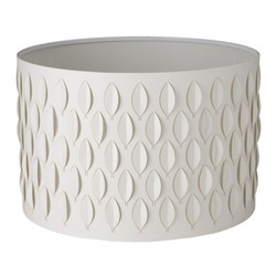 Leal Shade - Another twist on the white drum. It can be tricky to find a suitable light for a room that already has enough color and pattern. This cute cut-out style adds some lovely texture and interest without taking away from your other focal points.