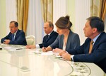 File - U.S. Secretary of State John Kerry, accompanied by U.S. Ambassador to Russia Michael McFaul, meets with Russian President Vladimir Putin, second from left, and Russian Foreign Minister Sergey Lavrov, far left, in Moscow, Russia, on May 7, 2013.