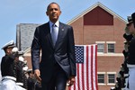 File - Secretary of Homeland Security Jeh Johnson joins President Barack Obama and Adm. Paul Zukunft, commandant of the U.S. Coast Guard at the Coast Guard Academy 2015 Commencement Ceremony May 20, 2015.