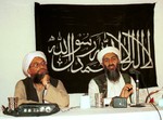 In this 1998 file photo made available Friday, March 19, 2004, Ayman al-Zawahri, left, holds a press conference with Osama bin Laden in Khost, Afghanistan.