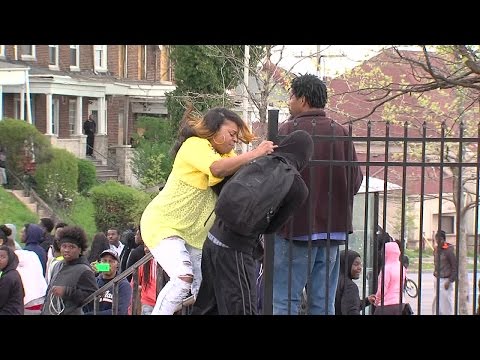 ORIGINAL: Angry mother beats son for participating in Baltimore riots