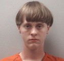 This April 2015 photo released by the Lexington County (S.C.) Detention Center shows Dylann Roof, 21.  Charleston Police identified Roof as the shooter who opened fire during a prayer meeting inside the Emanuel AME Church in Charleston, S.C., Wednesday, June 17, 2015, killing several people.  (Lexington County (S.C.) Detention Center via AP)