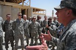 File - U.S. Army Gen. David Petraeus, Multi-National Force - Iraq Commander, thanks the U.S. Soldiers, Sailors, Airmen and Marines during his visit to the Joint Security Station in the Sadr City district of Baghdad, Iraq, June 4, 2008.