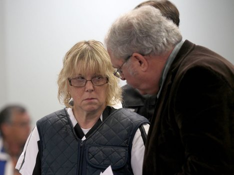 Joyce Mitchell stands with her lawyer Steven Johnston, appearing before Judge Mark Rogers in Plattsburgh City Court, New York, for a hearing Monday June 15, 2015.