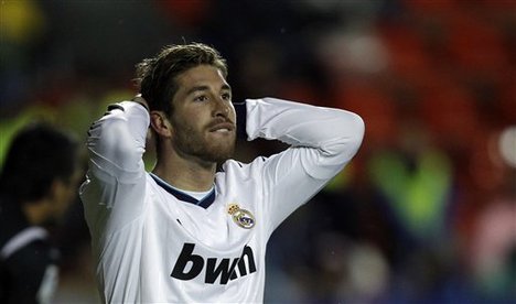 Real Madrid's Sergio Ramos reacts after failing to score against Levante during their la liga soccer match at the Ciutat Valencia stadium in Valencia, Spain, Sunday, Nov. 11, 2012.