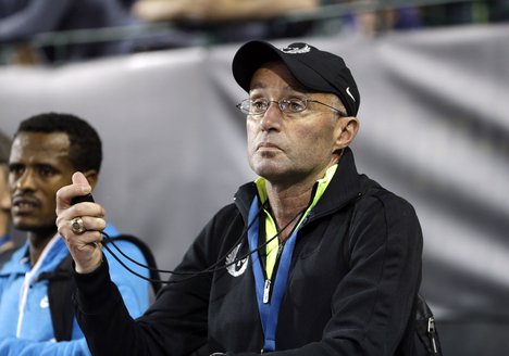 A Friday, May 29, 2015 photo from files showing coach, Alberto Salazar, taking timings during the Prefontaine Classic track and field meet in Eugene, Ore.