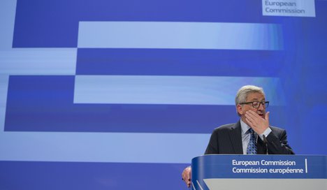 European Commission President Jean-Claude Juncker pauses before speaking during a media conference at EU headquarters in Brussels on Monday, June 29, 2015.