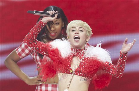 Miley Cyrus performs during the opening show of the Bangerz Tour, on Friday Feb. 14, 2014 in Vancouver, Canada.