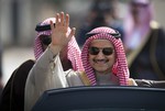 Saudi billionaire Prince Alwaleed bin Talal, waves as he arrives at the headquarters of Palestinian President Mahmoud Abbas in the West Bank city of Ramallah, Tuesday, Feb. 4, 2014.