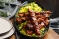 Pork skewers with bean, pea & zucchini saffron rice