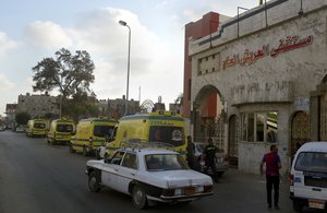 Ambulances wait in front of the El Arish International hospital because the road to Sheikh Zuweid, where numerous assaults against the army are ongoing, is not safe, in El Arish, north Sinai, Egypt, Wednesday, July 1, 2015.