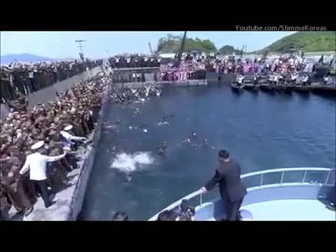 North Koreans jump into the water to reach Kim Jong Un's boat!