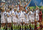 United States players celebrate after Carli Lloyd (10) scored a goal against Japan during the first half of the FIFA Women's World Cup soccer championship in Vancouver