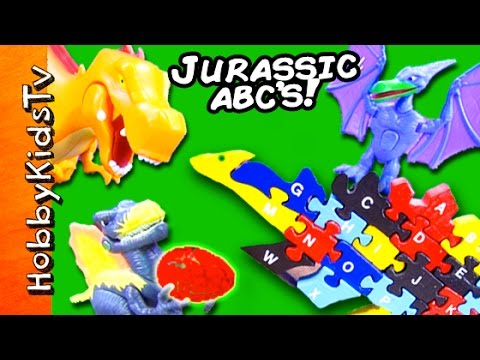 JURASSIC Dinosaur ABC's Wood Puzzle SURPRISE Eggs! T Rex Stegosaurus Triceratops by HobbyKidsTV