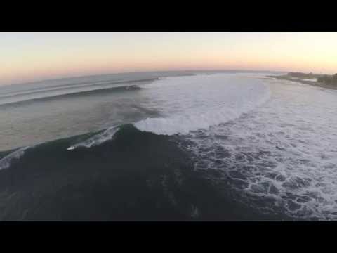 Laird Hamilton SUP surfing epic waves in Malibu!! Shoots the pier twice!!