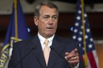 Speaker of the House John Boehner, R-Ohio, gestures while speaking with reporters on Capitol Hill in Washington, Thursday, July 9, 2015.