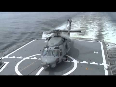 Royal Australian Navy MH-60R 'Romeo' helicopter fires AGM-114 Hellfire missile for the 1st time