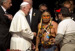 Pope Francis talks to Indian leaders and social workers at the second World Meeting of Popular Movements in Santa Cruz, Bolivia, Thursday, July 9, 2015.