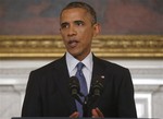 President Barack Obama speaks about the situation in Iraq in the State Dining Room at the White House in Washington, Thursday, Aug. 7, 2014.