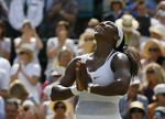 Serena Williams of the United States celebrates winning the singles match Garbine Muguruza of Spain after the women's singles final at the All England Lawn Tennis Championships in Wimbledon, London, Saturday July 11, 2015. Williams won 6-4, 6-4.