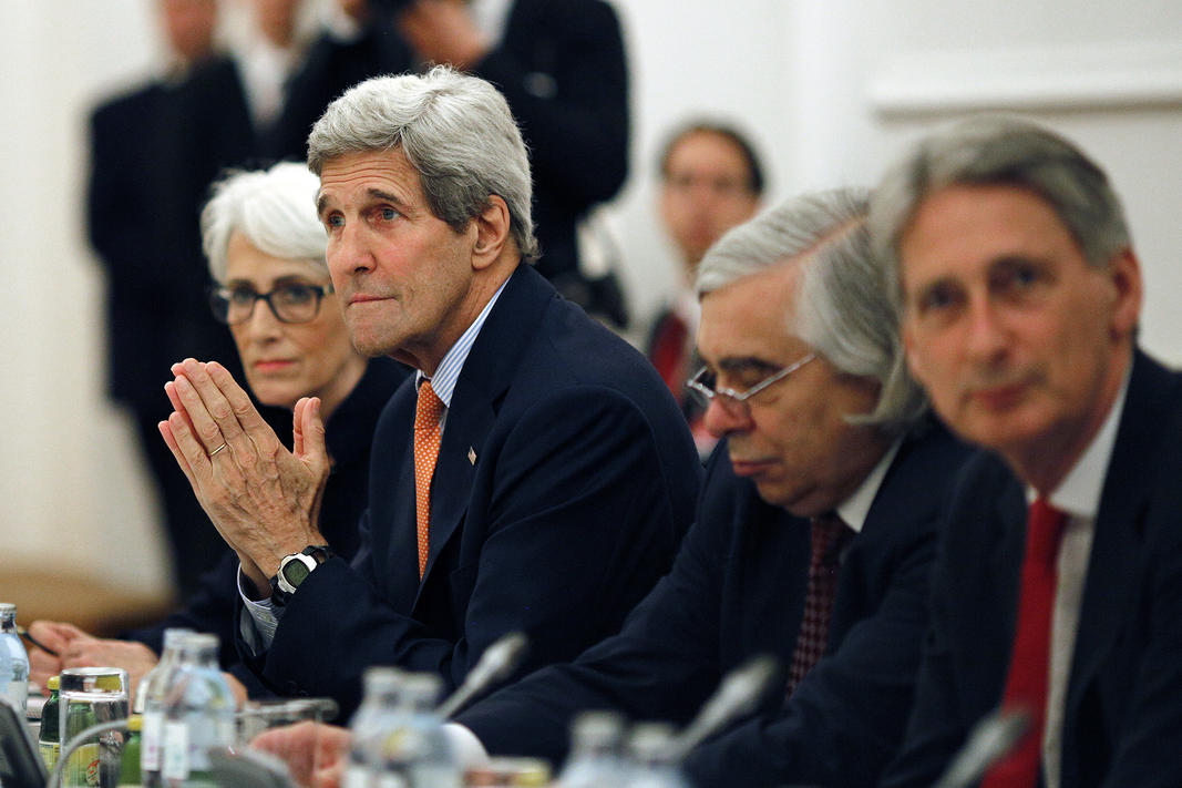 U.S. Secretary of State John Kerry meets with foreign ministers of Germany, France, China, Britain, Russia and the European Union at a hotel in Vienna, Austria on July 7, 2015. (Photo by Carlos Barria/Pool/AP)