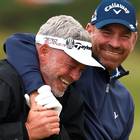 Thomas Bjorn of Denmark jokes with Darren Clarke of Northern Ireland during practice ahead of the 144th Open Championship at The Old Course on July 14, 2015 in St Andrews, Scotland.  (Photo by Stuart Franklin/Getty Images)