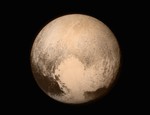 Pluto nearly fills the frame in this image from the Long Range Reconnaissance Imager (LORRI) aboard NASA’s New Horizons spacecraft, taken on July 13, 2015 when the spacecraft was 476,000 miles (768,000 kilometers) from the surface.