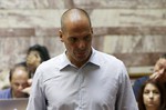 Parliament Member Yanis Varoufakis arrives for a meeting with lawmakers of Syriza governing party at the Greek Parliament in Athens, Wednesday, July 15, 2015.