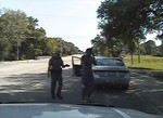 In this July 10, 2015, frame from dashcam video provided by the Texas Department of Public Safety, trooper Brian Encinia arrests Sandra Bland after she became combative during a routine traffic stop in Waller County, Texas.