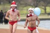 Travis Leemhuis and Jaimie Elliott-Svoronos run for the Cystic Fibrosis ACT's annual 6500 Santa Speedo Shuffle.