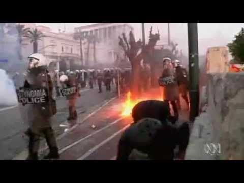 Tens of thousands of Greeks protest in violent clash over debt plan