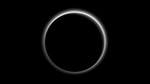 This July 15, 2015 image made available by NASA on Friday, July 24, 2015 shows the atmosphere of Pluto backlit by the sun when the New Horizons spacecraft was about 1.25 million miles (2 million kilometers) away.