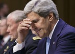 Secretary of State John Kerry shows frustration at questioning from Sen. Rand Paul, R-Ky., at a Senate Foreign Relations Committee hearing about President Barack Obama's request for congressional authorization for military intervention in Syria, a response to last month's alleged sarin gas attack in the Syrian civil war, on Capitol Hill in Washington, Tuesday, Sept. 3, 2013.