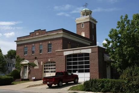 This Belmont home was once a fire station. The truck bays are now a family room and garage.
