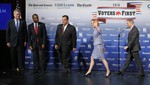 Republican presidential candidates gather on stage before a forum Monday, Aug. 3, 2015, in Manchester, N.H. From left: former Florida Gov. Jeb Bush, retired neurosurgeon Ben Carson, New Jersey Gov. Chris Christie, businesswoman Carly Fiorina, and Sen. Lindsey Graham, R-S.C.