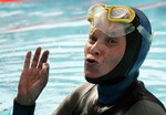 File - Natalia Molchanova of Russia reacts after she set a new world record, holding her breath underwater for 7 minutes and 16 seconds, during the static apnea women final event at the 1st Individual World Freediving Championship in Pool, in Renens near Lausanne, Switzerland, on Friday, Aug. 26, 2005.