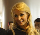 File - Paris Hilton in a Shanghai mall during a September 2012 event in China.