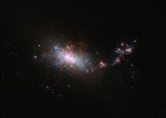 This dramatic image shows the NASA/ESA Hubble Space Telescope’s view of dwarf galaxy known as NGC 1140, which lies 60 million light-years away in the constellation of Eridanus, 24 July, 2015.