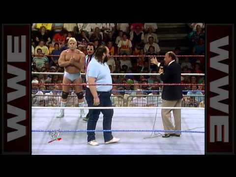 Earthquake is picked out of the crowd to assist Dino Bravo in a pushup contest: Superstars, Oct. 2,