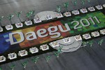 File - Dancers perform and beat drums during the opening ceremony at the World Athletics Championships in Daegu, South Korea, Saturday, Aug. 27, 2011.