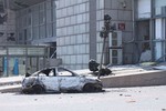 2015 China Tianjin explosions : Wrecked cars and buildings damaged by a shockwave in a residential area near the facility.