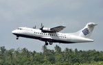 In this photo taken Dec. 26, 2010, Trigana Air Service's ATR42-300 twin turboprop plane takes off at Supadio airport in Pontianak, West Kalimantan, Indonesia. The same type of a Trigana airliner carrying 54 people was missing Sunday, Aug. 16, 2015 after losing contact with ground control during a short flight in bad weather in the country's mountainous easternmost province of Papua, officials said. A search for the plane was suspended and will resume Monday morning. (AP Photo)