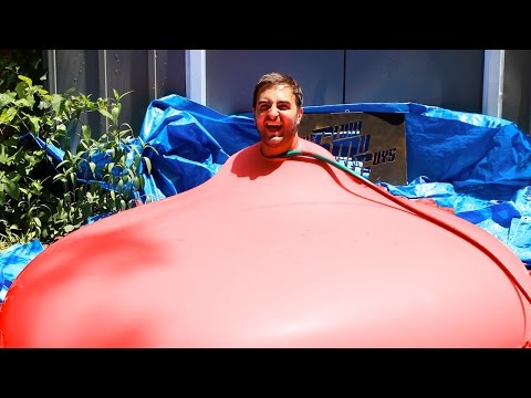 6ft Man in 6ft Giant Water Balloon - 4K - The Slow Mo Guys